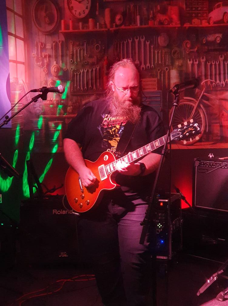 Guitarist playing live