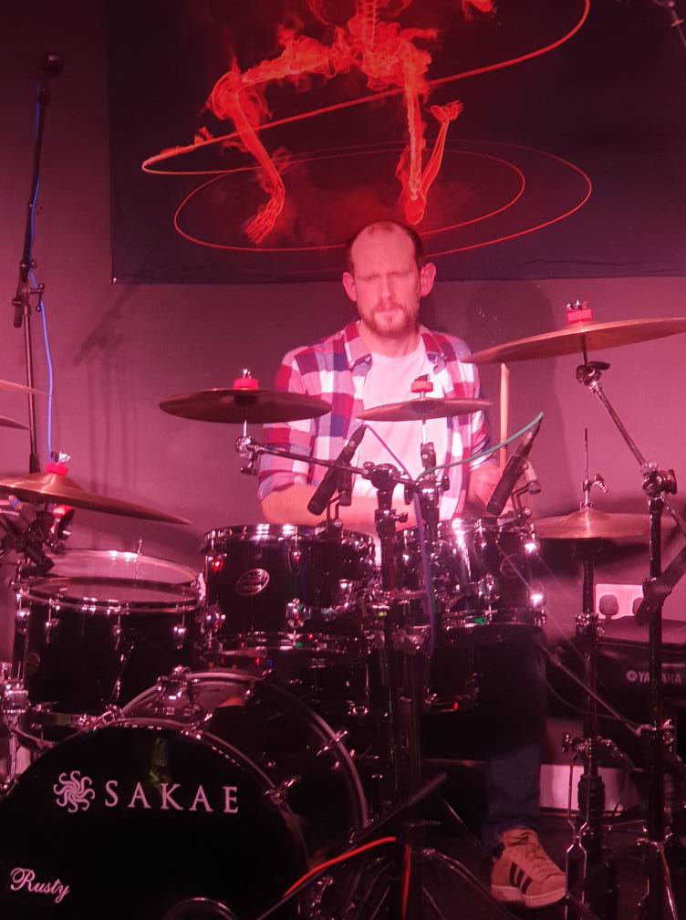 Drummer playing live