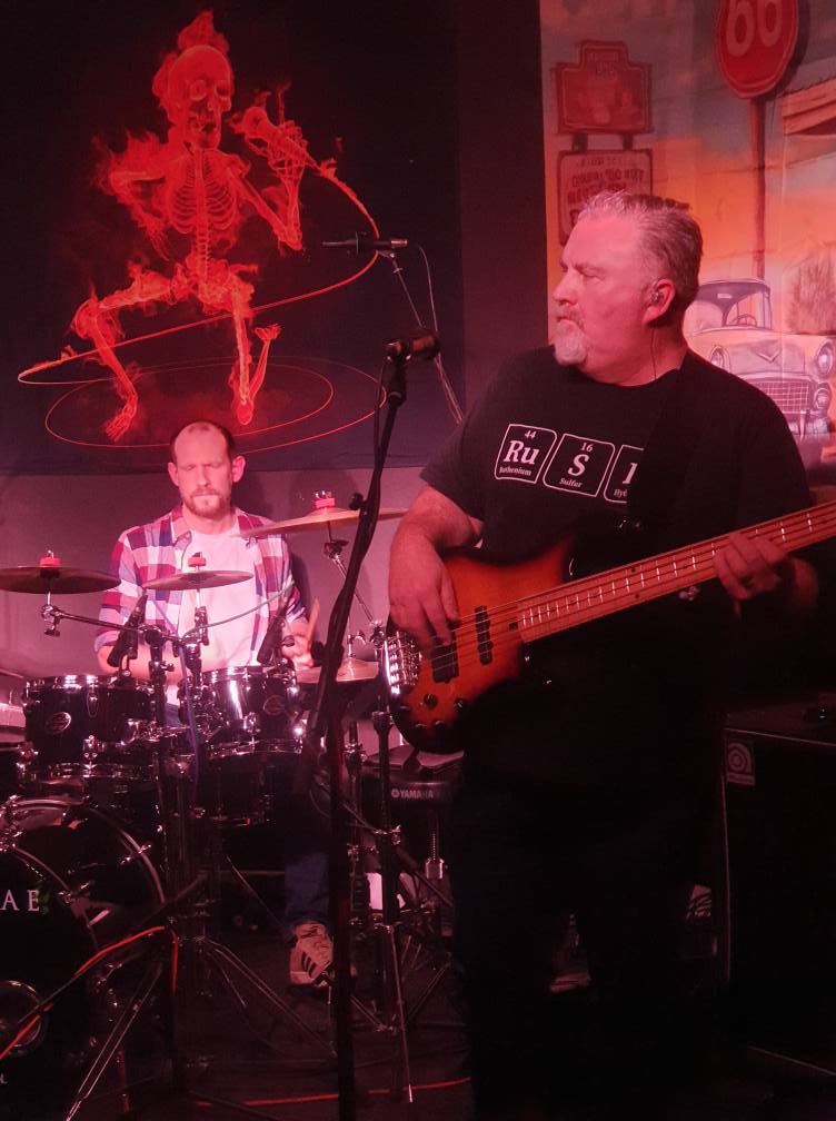 Bassist playing live